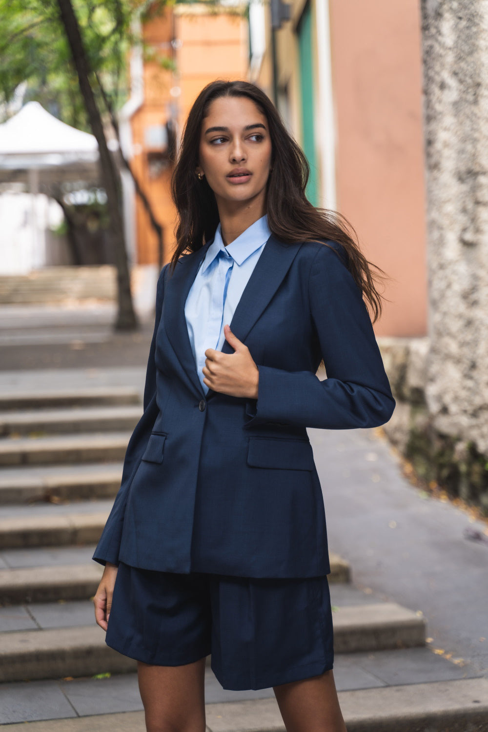 Tailored Blazer, tailored shorts paired with blue silhouette shirt